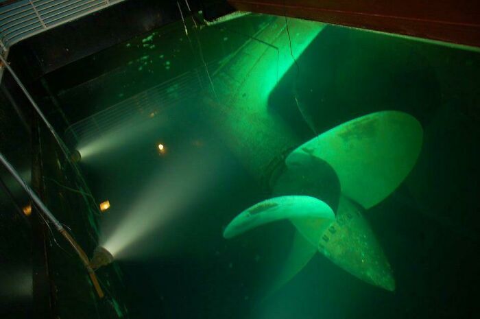 Underwater propeller photo of the Queen Mary's propeller room. Submechanophobia.