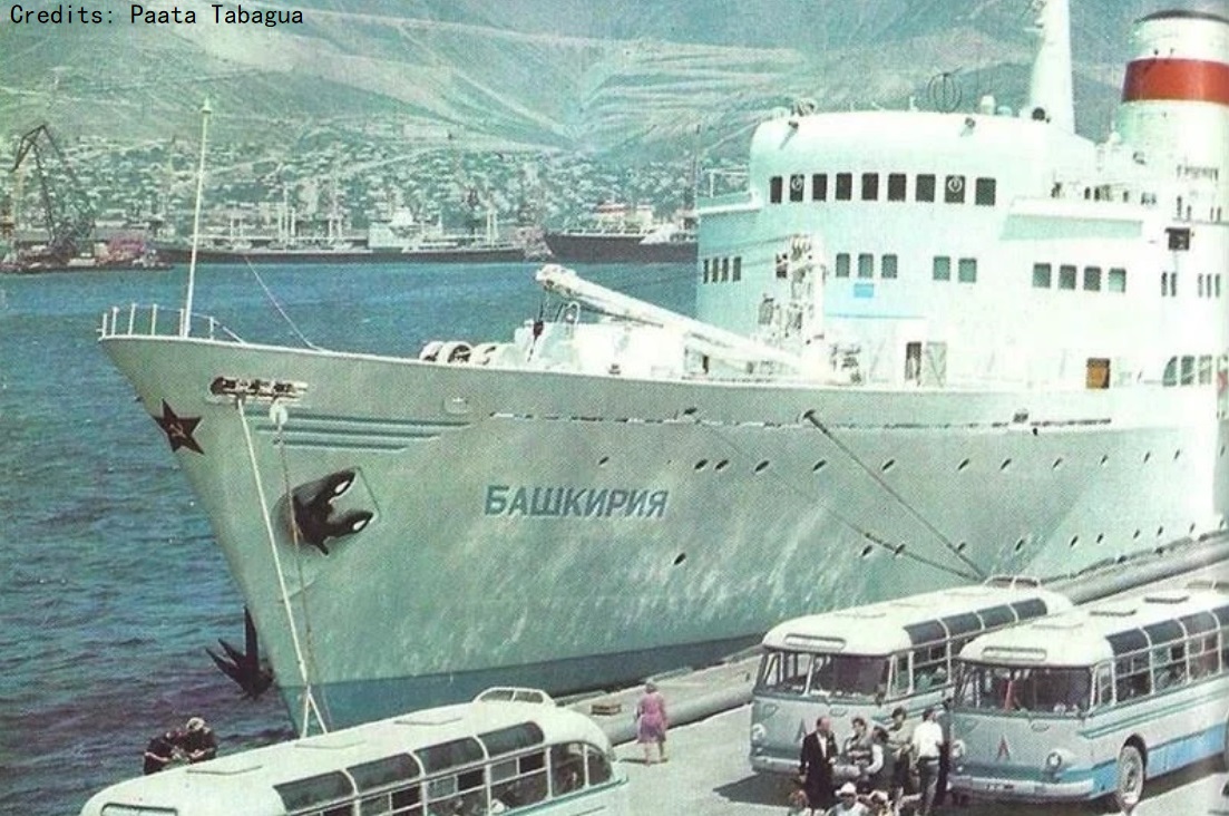 The Soviet Union Mikhail Khalinin-class MS Bashkiriya takes back tour buses, possibly in Novorossiysk