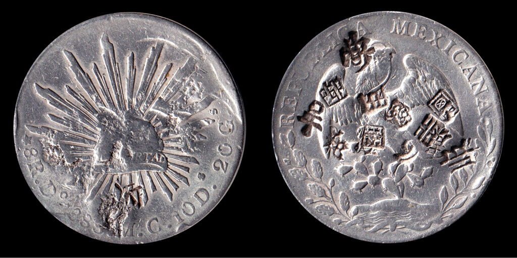1888 Republica Méxicana 8 Reals Silver "Trade Coin" with multiple "chop" marks made by Chinese merchants to assure it authenticity.