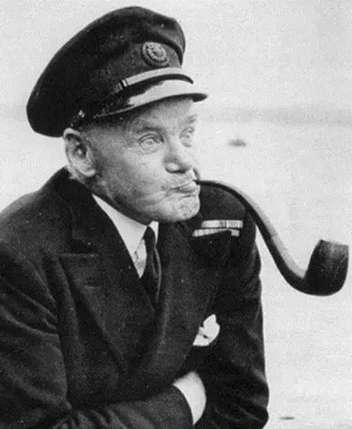 Charles Lightoller smoking his pipe. 