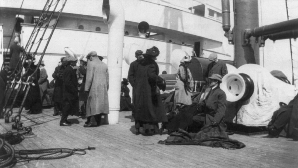 Groups of Titanic survivors aboard the Carpathia. 