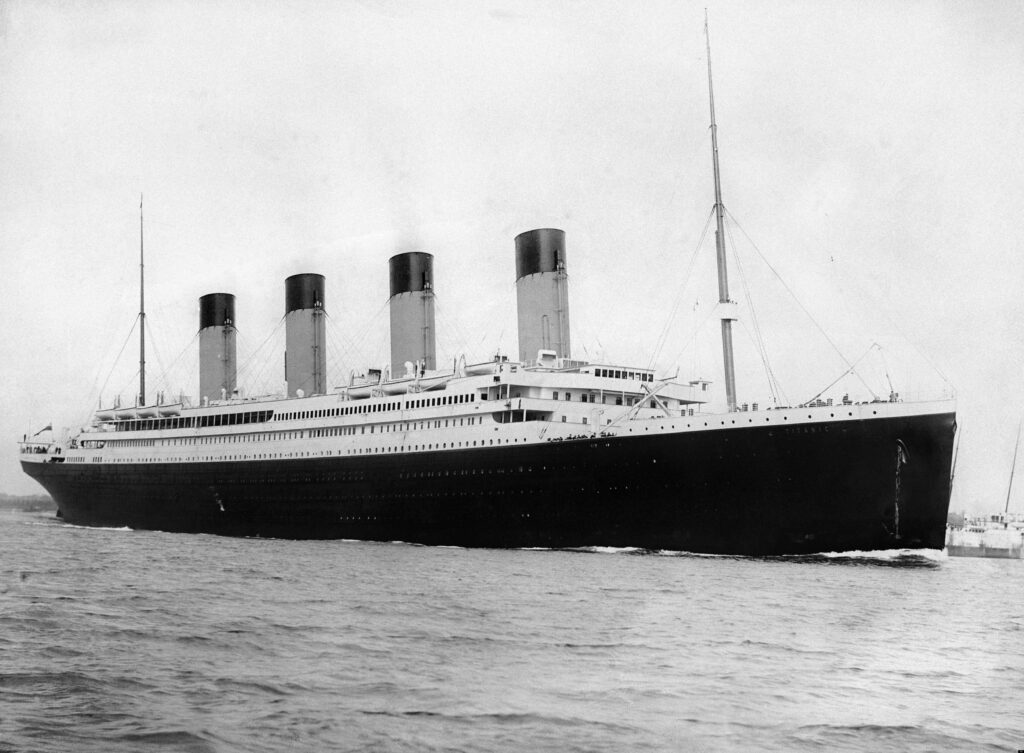 The Titanic departing Southampton, showing eight lifeboats along the starboard-side boat deck. 