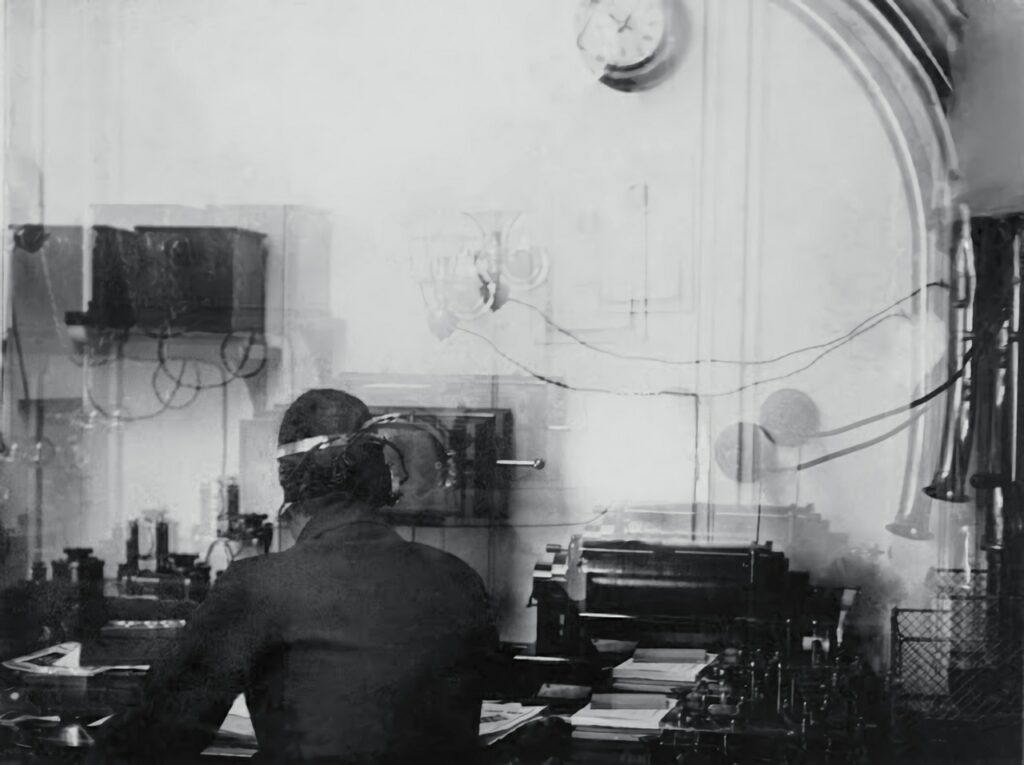 The only photo of Harold Bride seated in Titanic's Marconi radio room, 11 April 1912. 